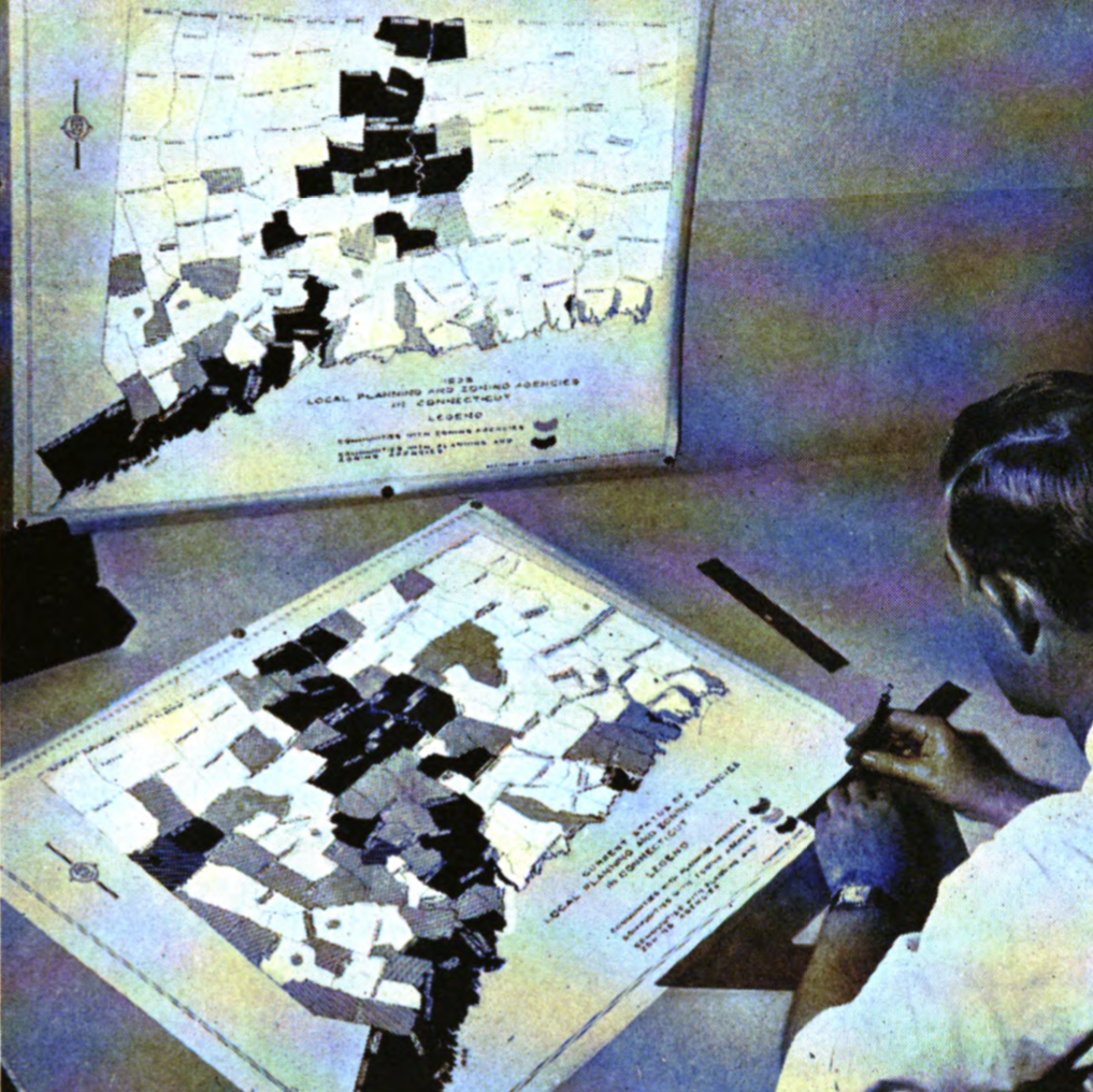 A Connecticut Development Commission employee reviews a 1938 map of local planning and zoning agencies in order to create an updated version in this photo from their 1944-1946 report. Zoning grew most quickly in suburban towns clustered around the major cities of Hartford, Bridgeport, and New Haven.