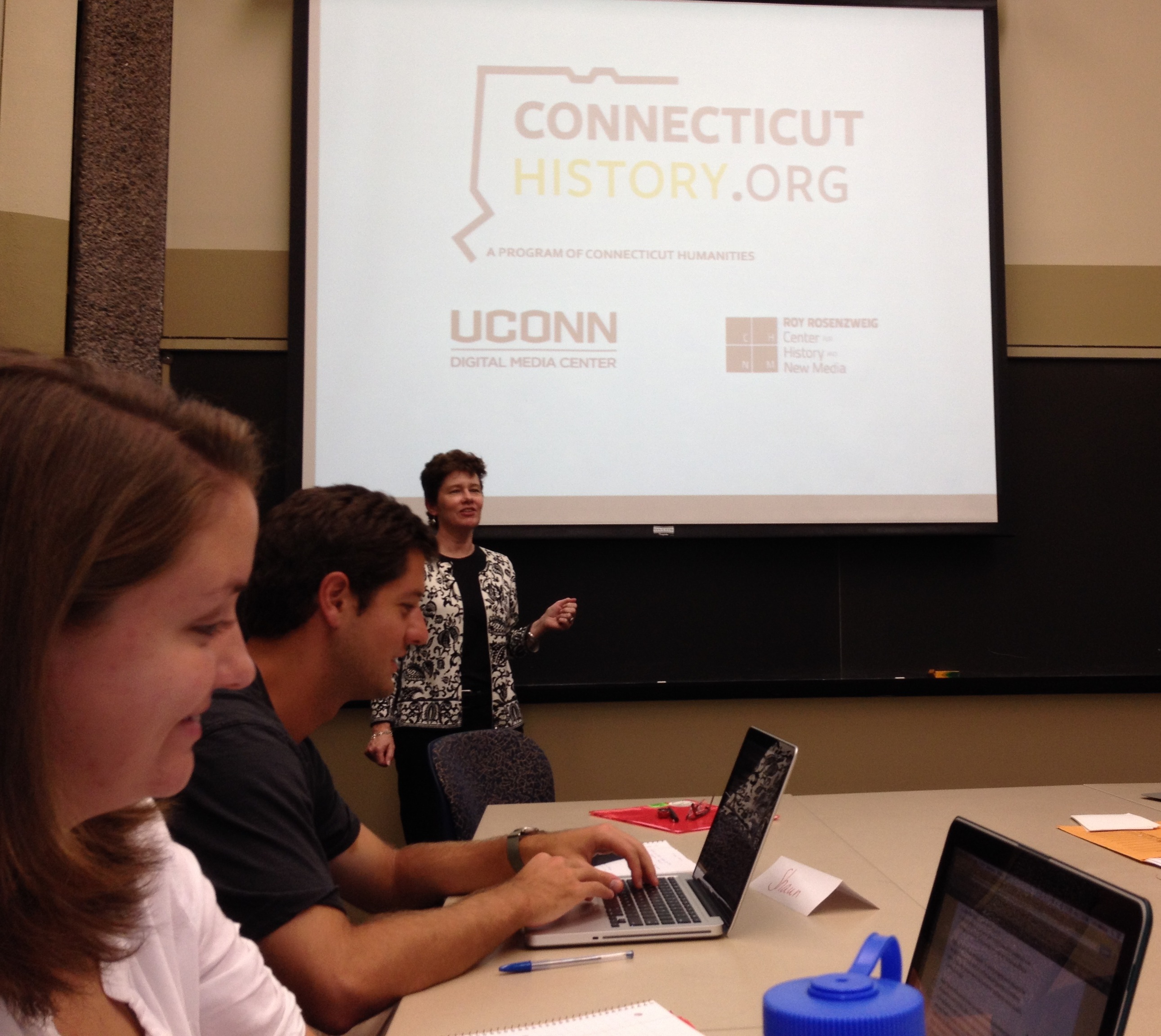 Clarissa Ceglio teaches Trinity students Emily Meehan and Sean McGann how to write for ConnecticutHistory.org.
